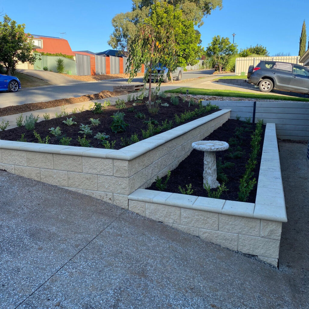 Front garden terraced garden walls after