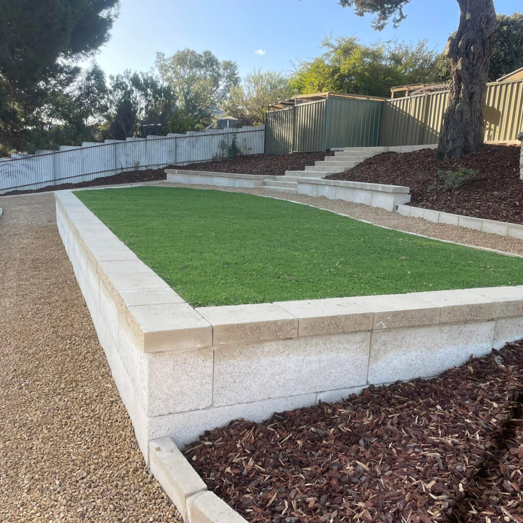 Limestone Block Retaining Wall After | Evergreen Landscaping